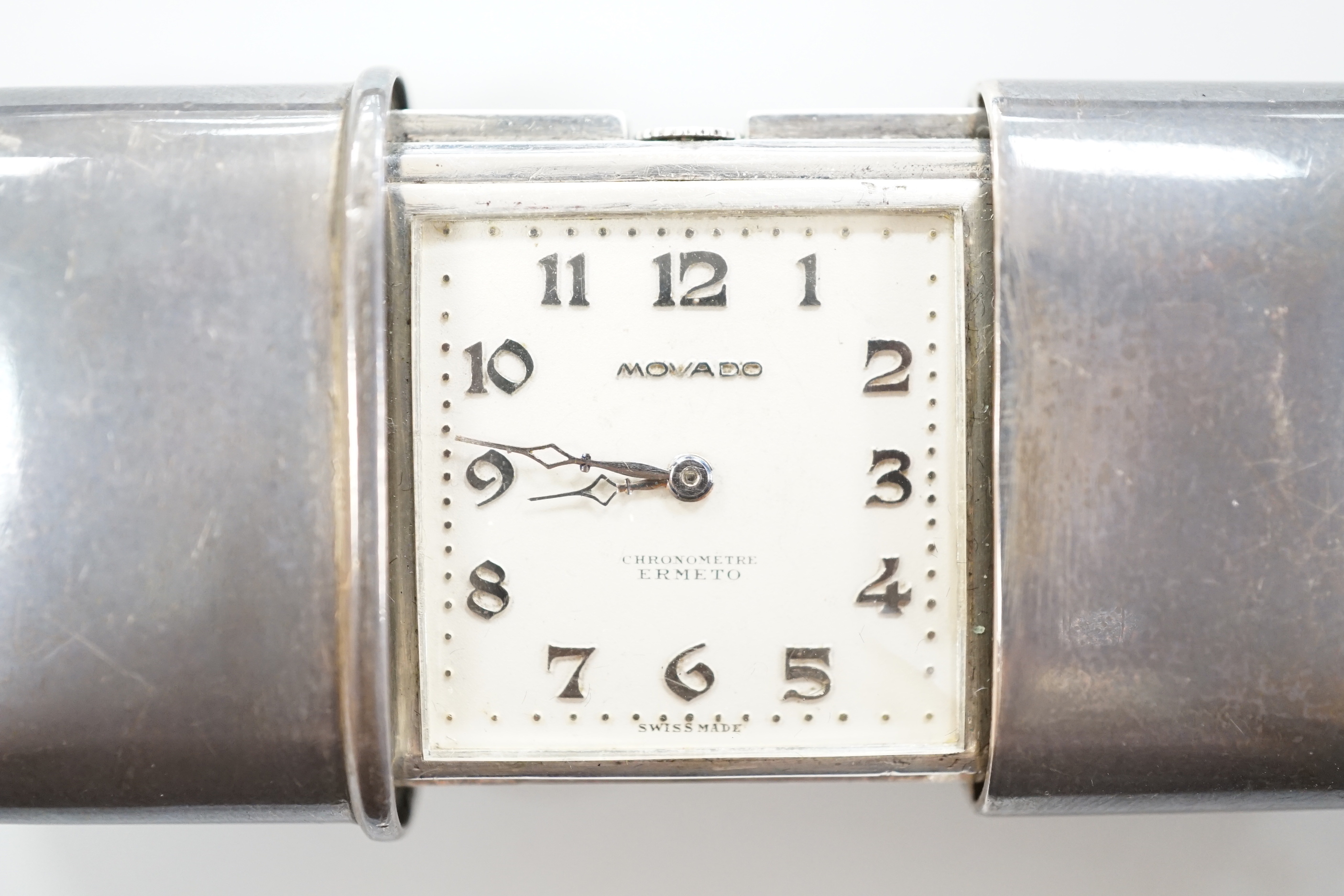A 1920's silver cased Movado travelling watch, 47mm, import marks for London, 1928.